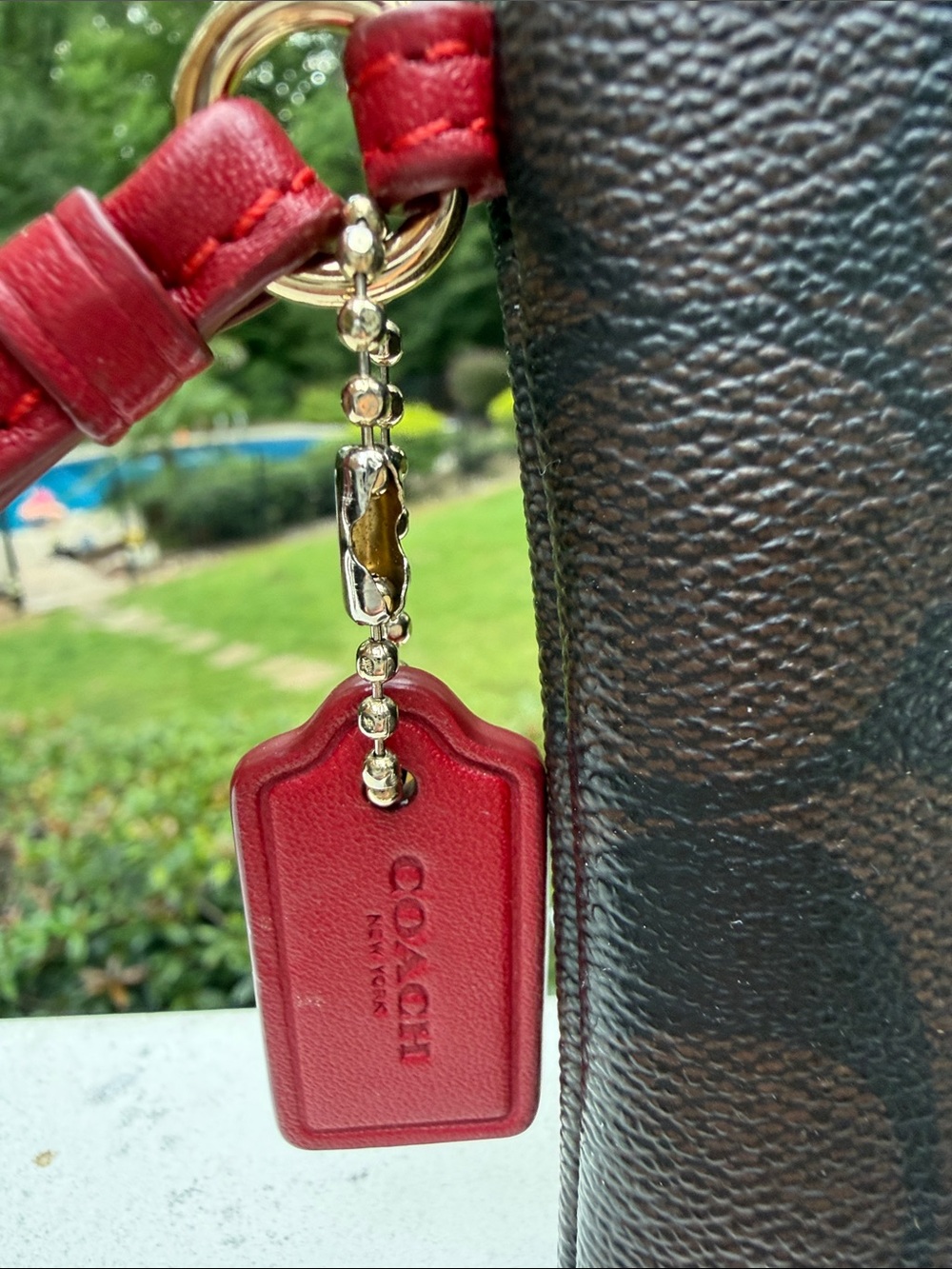 COACH Signature Stripe Zip Wristlet in Brown and Red - Picture 2 of 16